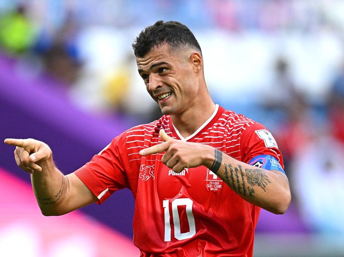 AL WAKRAH, QATAR - NOVEMBER 24: Granit Xhaka of Switzerland reacts during the FIFA World Cup Qatar 2022 Group G match between Switzerland and Cameroon at Al Janoub Stadium on November 24, 2022 in Al Wakrah, Qatar. (Photo by Stuart Franklin/Getty Images)