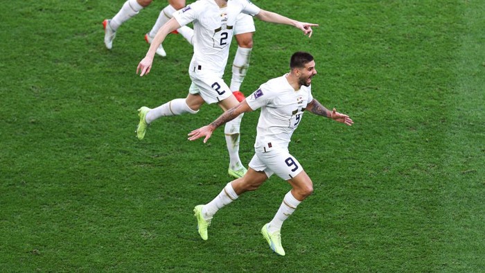 AL WAKRAH, QATAR - NOVEMBER 28: Aleksandar Mitrovic of Serbia celebrates after scoring a goal to make it 1-3  during the FIFA World Cup Qatar 2022 Group G match between Cameroon and Serbia at Al Janoub Stadium on November 28, 2022 in Al Wakrah, Qatar. (Photo by Robbie Jay Barratt - AMA/Getty Images)