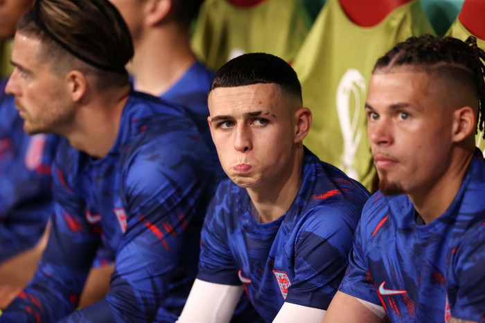 AL KHOR, QATAR - NOVEMBER 25: Phil Foden of England reacts in the dugout prior to the FIFA World Cup Qatar 2022 Group B match between England and USA at Al Bayt Stadium on November 25, 2022 in Al Khor, Qatar. (Photo by Ryan Pierse/Getty Images)