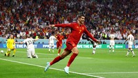 Morata merayakan usai mencetak gol untuk timnya. Reuters/Kai Pfaffenbach 