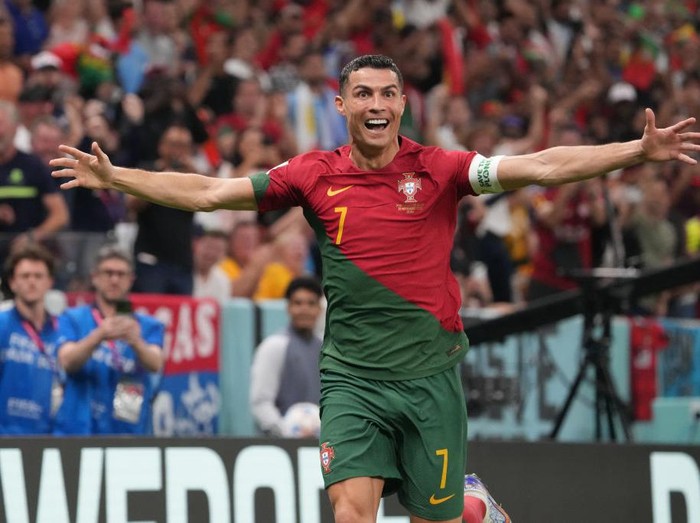 LUSAIL CITY, QATAR - NOVEMBER 28: Cristiano Ronaldo of Portugal celebrates his side's first goal during the FIFA World Cup Qatar 2022 Group H match between Portugal and Uruguay at Lusail Stadium on November 28, 2022 in Lusail City, Qatar. (Photo by Etsuo Hara/Getty Images)