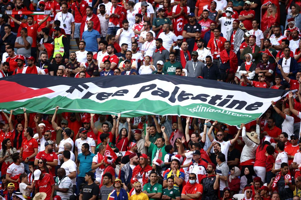 AL WAKRAH, QATAR - NOVEMBER 26: Fans hold a banner reading 