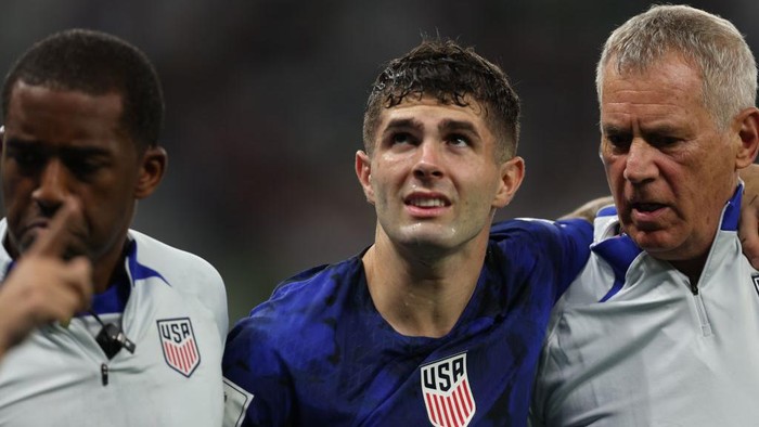 DOHA, QATAR - NOVEMBER 29: Christian Pulisic of USA is injured during the FIFA World Cup Qatar 2022 Group B match between IR Iran and USA at Al Thumama Stadium on November 29, 2022 in Doha, Qatar. (Photo by Amin Mohammad Jamali/Getty Images)