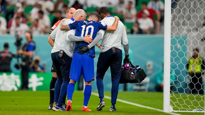 DOHA, QATAR - NOVEMBER 29: Christian Pulisic of USA injured after scoring the goal during the FIFA World Cup Qatar 2022 Group B match between IR Iran and USA at Al Thumama Stadium on November 29, 2022 in Doha, Qatar. (Photo by Ulrik Pedersen/DeFodi Images via Getty Images)