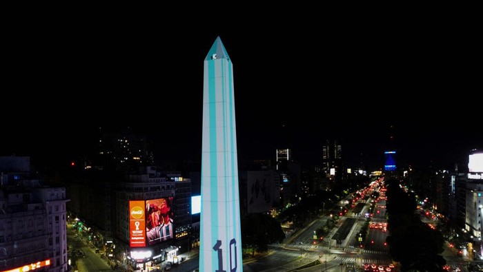 An image of Lionel Messi's jersey number 10 is projected onto the Buenos Aires Obelisk, on the eve of the FIFA World Cup Qatar 2022 soccer match between Argentina and Poland, in Buenos Aires, Argentina November 29, 2022. REUTERS/Agustin Marcarian