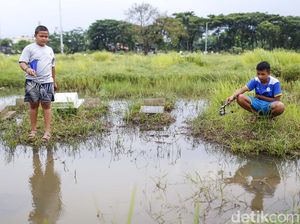 Sensasi Mancing di Area Pemakaman, Berani Coba?