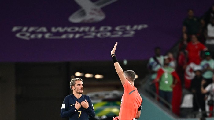 New Zealander referee Matthew Conger disallows a goal from Frances forward #07 Antoine Griezmann after a VAR review during the Qatar 2022 World Cup Group D football match between Tunisia and France at the Education City Stadium in Al-Rayyan, west of Doha on November 30, 2022. (Photo by Anne-Christine POUJOULAT / AFP) (Photo by ANNE-CHRISTINE POUJOULAT/AFP via Getty Images)