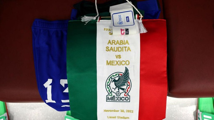 LUSAIL CITY, QATAR - NOVEMBER 30: The match pennant and Protect Children captains armband are seen in the Mexico dressing room prior to the FIFA World Cup Qatar 2022 Group C match between Saudi Arabia and Mexico at Lusail Stadium on November 30, 2022 in Lusail City, Qatar. (Photo by Patrick Smith - FIFA/FIFA via Getty Images)