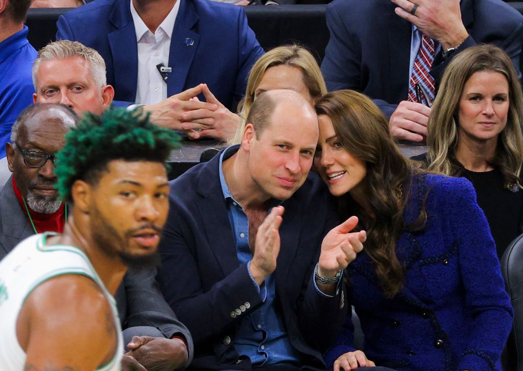 BOSTON, MA - NOVEMBER 30: Prince William, Prince of Wales and Catherine, Princess of Wales, center, watch the NBA basketball game between the Boston Celtics and the Miami Heat during the first quarter at TD Garden on November 30, 2022 in Boston, Massachusetts. NOTE TO USER: User expressly acknowledges and agrees that, by downloading and/or using this Photograph, user is consenting to the terms and conditions of the Getty Images License Agreement. (Photo By Winslow Townson/Getty Images)