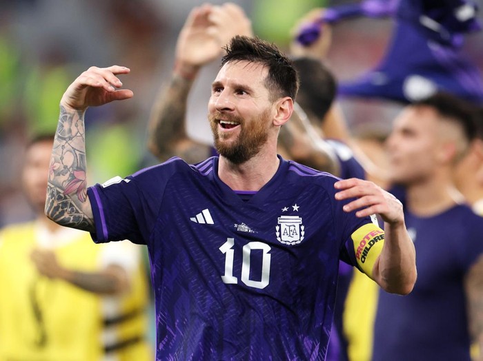 DOHA, QATAR - NOVEMBER 30: Lionel Messi of Argentina applauds fans after the 2-0 win during the FIFA World Cup Qatar 2022 Group C match between Poland and Argentina at Stadium 974 on November 30, 2022 in Doha, Qatar. (Photo by Catherine Ivill/Getty Images)