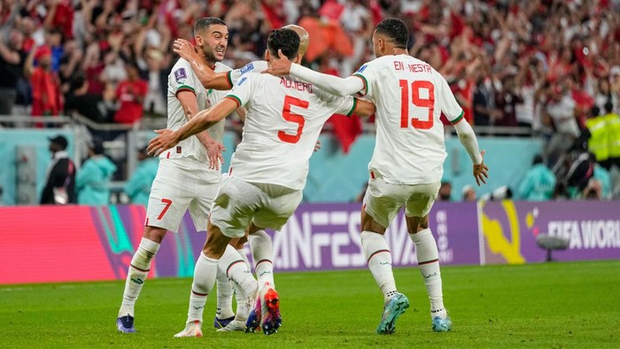 DOHA, QATAR - NOVEMBER 27: Hakim Ziyech of Morocco celebrates after scoring his teams first disallowed offside goal during the FIFA World Cup Qatar 2022 Group F match between Belgium and Morocco at Al Thumama Stadium on November 27, 2022 in Doha, Qatar. (Photo by Ulrik Pedersen/DeFodi Images via Getty Images)