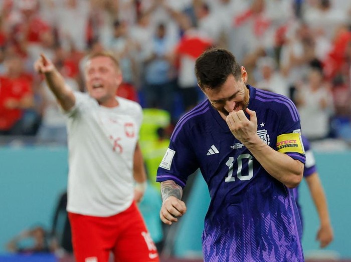 Argentina's forward #10 Lionel Messi reacts after he missed a penalty shot during the Qatar 2022 World Cup Group C football match between Poland and Argentina at Stadium 974 in Doha on November 30, 2022. (Photo by Odd ANDERSEN / AFP) (Photo by ODD ANDERSEN/AFP via Getty Images)