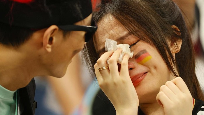 Soccer Football - FIFA World Cup Qatar 2022 - Group E - Costa Rica v Germany - Al Bayt Stadium, Al Khor, Qatar - December 2, 2022
A Germany fan looks dejected after the match as Germany are eliminated from the World Cup REUTERS/Wolfgang Rattay