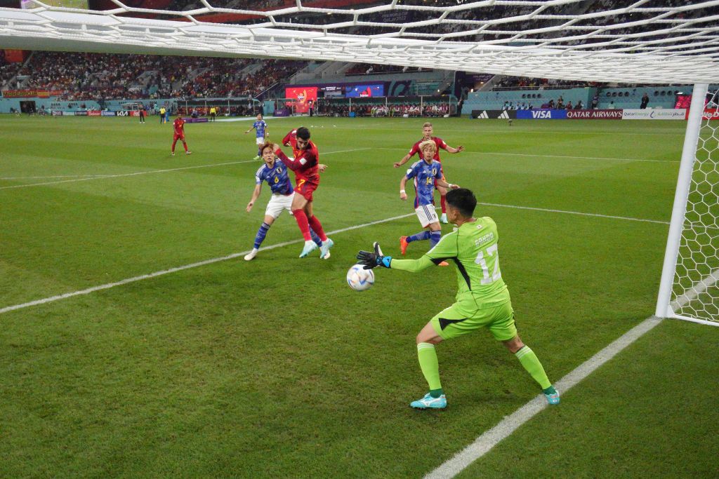 DOHA, QATAR - DECEMBER 01: (EDITORS NOTE: In this photo taken from a remote camera from inside the goal) Alvaro Morata of Spain heads to score the first goal past Shuichi Gonda of Japan during the FIFA World Cup Qatar 2022 Group E match between Japan and Spain at Khalifa International Stadium on December 01, 2022 in Doha, Qatar. (Photo by Ryan Pierse/Getty Images)