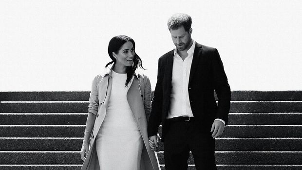 This image released by Netflix shows Prince Harry and Meghan, Duke and Duchess of Sussex, in a scene from the upcoming documentary 