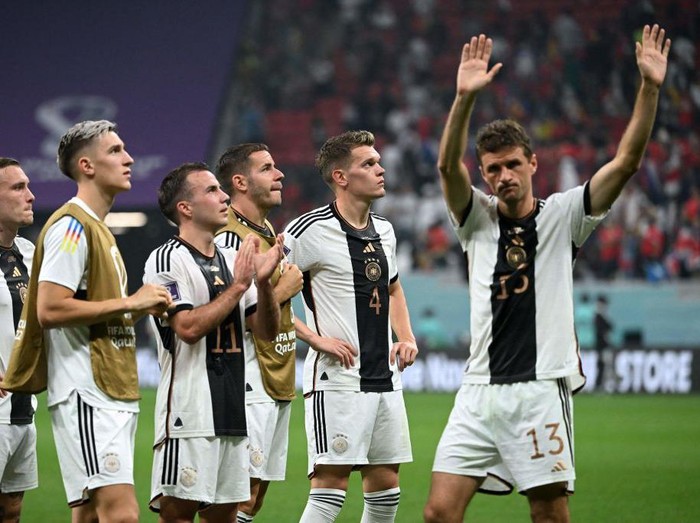 Germany's players gesture to fans at the end of the Qatar 2022 World Cup Group E football match between Costa Rica and Germany at the Al-Bayt Stadium in Al Khor, north of Doha on December 1, 2022. (Photo by Ina Fassbender / AFP) (Photo by INA FASSBENDER/AFP via Getty Images)