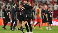 Kejutan terjadi di Grup F Piala Dunia 2022. Maroko mengunci tiket ke 16 besar dengan status jawara grup dan menjadi tim Afrika pertama yang melakukannya abad ini. (Youssef Loulidi/Getty Images)