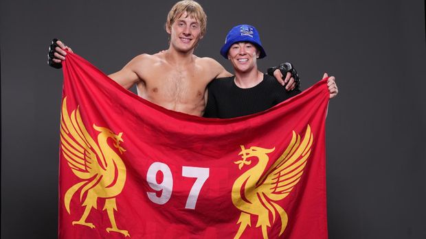 LONDON, ENGLAND - JULY 23: Teammates Paddy Pimblett and Molly McCann of England pose for a photo backstage after their victories during the UFC Fight Night event at O2 Arena on July 23, 2022 in London, England. (Photo by Mike Roach/Zuffa LLC)