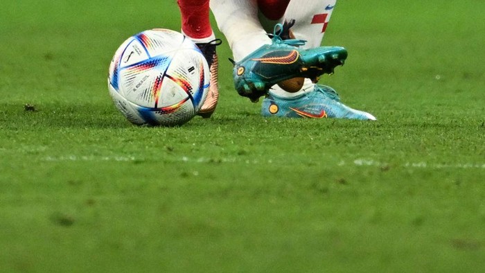 Belgiums midfielder #11 Yannick Carrasco fights for the ball with Croatias midfielder #10 Luka Modric during the Qatar 2022 World Cup Group F football match between Croatia and Belgium at the Ahmad Bin Ali Stadium in Al-Rayyan, west of Doha on December 1, 2022. (Photo by OZAN KOSE / AFP) (Photo by OZAN KOSE/AFP via Getty Images)