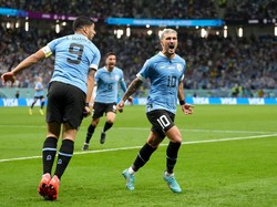 Uruguay mampu mengalahkan Ghana 2-0 di matchday terakhir Grup G Piala Dunia 2022 di Al Janoub Stadium, Jumat (2/12/2022) malam WIB. Luis Suarez berperan besar dalam dua gol La Celeste yang diborong Giorgian de Arrascaeta (Foto: PA Images via Getty Images/Nick Potts - PA Images)