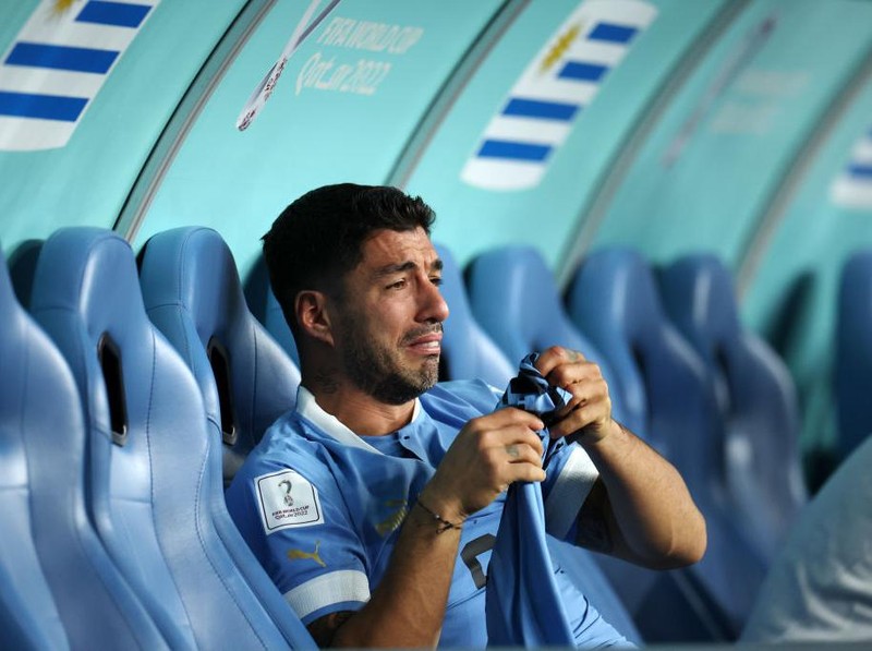AL WAKRAH, QATAR - DECEMBER 02: Luis Suarez of Uruguay shows dejection after the team fails to qualify for the knockout stage despite their 2-0 victory in the FIFA World Cup Qatar 2022 Group H match between Ghana and Uruguay at Al Janoub Stadium on December 02, 2022 in Al Wakrah, Qatar. (Photo by Maja Hitij - FIFA/FIFA via Getty Images)