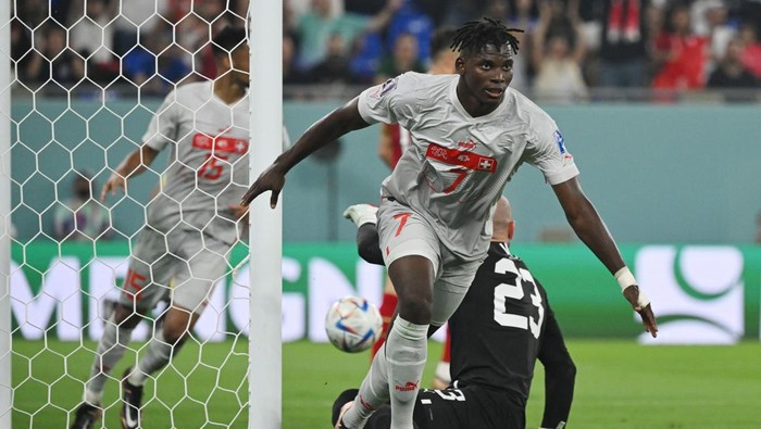 Switzerlands forward #07 Breel Embolo celebrates after scoring his teams second goal during the Qatar 2022 World Cup Group G football match between Serbia and Switzerland at Stadium 974 in Doha on December 2, 2022. (Photo by ANDREJ ISAKOVIC / AFP) (Photo by ANDREJ ISAKOVIC/AFP via Getty Images)