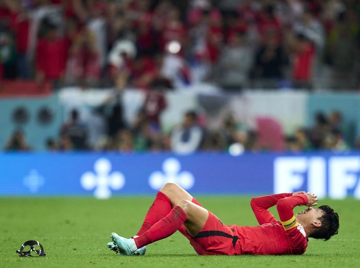AL RAYYAN, QATAR - DECEMBER 02: Heungmin Son of Korea Republic celebrates victory after the FIFA World Cup Qatar 2022 Group H match between Korea Republic and Portugal at Education City Stadium on December 02, 2022 in Al Rayyan, Qatar. (Photo by Juan Luis Diaz/Quality Sport Images/Getty Images)