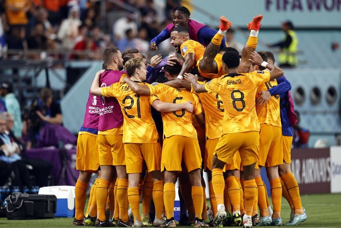DOHA, QATAR - DECEMBER 03: The Netherlands players sing the national anthem during the FIFA World Cup Qatar 2022 Round of 16 match between Netherlands and USA at Khalifa International Stadium on December 03, 2022 in Doha, Qatar. (Photo by Richard Heathcote/Getty Images)