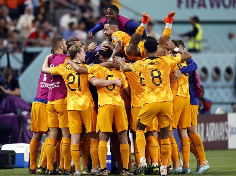 DOHA, QATAR - DECEMBER 03: The Netherlands players sing the national anthem during the FIFA World Cup Qatar 2022 Round of 16 match between Netherlands and USA at Khalifa International Stadium on December 03, 2022 in Doha, Qatar. (Photo by Richard Heathcote/Getty Images)