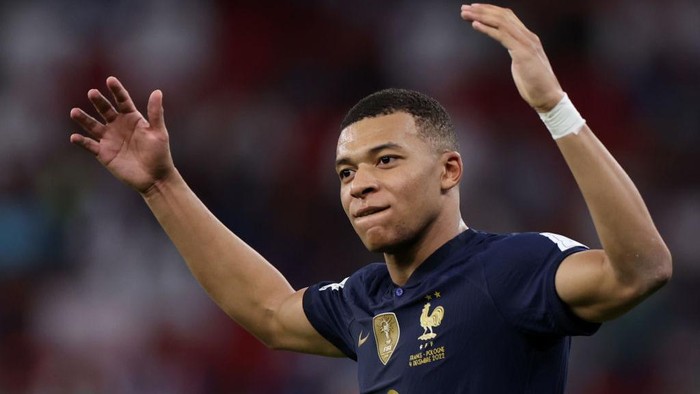 DOHA, QATAR - DECEMBER 04:   Kylian Mbappe of France celebrates after scoring the team's third goal during the FIFA World Cup Qatar 2022 Round of 16 match between France and Poland at Al Thumama Stadium on December 04, 2022 in Doha, Qatar. (Photo by Francois Nel/Getty Images)