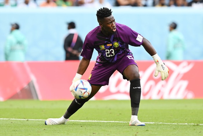 AL WAKRAH, QATAR - NOVEMBER 24: Andre Onana of Cameroon clears the ball during the FIFA World Cup Qatar 2022 Group G match between Switzerland and Cameroon at Al Janoub Stadium on November 24, 2022 in Al Wakrah, Qatar. (Photo by Claudio Villa/Getty Images)