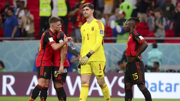 Belgiums Thorgan Hazard, Belgiums Eden Hazard, Belgiums goalkeeper Thibaut Courtois and Belgiums Jeremy Doku react after a draw result 0-0 meaning the elimination in the group phase at a soccer game between Belgiums national team the Red Devils and Croatia, the third and last game in Group F of the FIFA 2022 World Cup in Al Rayyan, State of Qatar on Thursday 01 December 2022.
BELGA PHOTO VIRGINIE LEFOUR (Photo by VIRGINIE LEFOUR / BELGA MAG / Belga via AFP) (Photo by VIRGINIE LEFOUR/BELGA MAG/AFP via Getty Images)