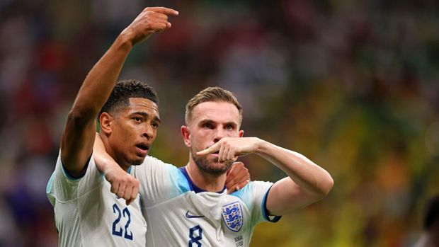 AL KHOR, QATAR - DECEMBER 04: Jordan Henderson of England celebrates as he scores the goal with Jude Bellingham of England   during the FIFA World Cup Qatar 2022 Round of 16 match between England and Senegal at Al Bayt Stadium on December 04, 2022 in Al Khor, Qatar. (Photo by Stefan Matzke - sampics/Corbis via Getty Images)