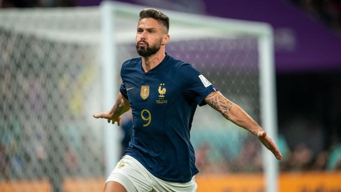 DOHA, QATAR - DECEMBER 4: Olivier Giroud #9 of France celebrates after scoring a goal during a FIFA World Cup Qatar 2022 Round of 16 game between Poland and France at Al Thumama Stadium on December 4, 2022 in Doha, Qatar. (Photo by John Todd/ISI Photos/Getty Images).