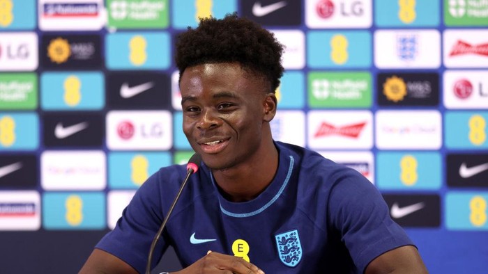 DOHA, QATAR - DECEMBER 05: Bukayo Saka of England speaks during the England Press Conference on the day after the Round of 16 match against Senegal at Al Wakrah Stadium on December 05, 2022 in Doha, Qatar. (Photo by Alex Pantling/Getty Images)