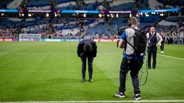 AL WAKRAH, QATAR - DECEMBER 05: Head Coach Hajime Moriyasu of Japan looks dejected and shows appreciation to the fans after the FIFA World Cup Qatar 2022 Round of 16 match between Japan and Croatia at Al Janoub Stadium on December 05, 2022 in Al Wakrah, Qatar. (Photo by Markus Gilliar - GES Sportfoto/Getty Images)