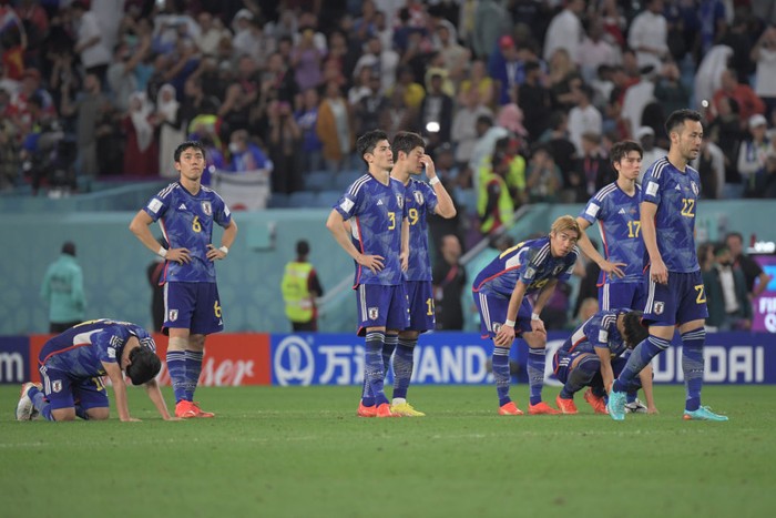 AL WAKRAH, QATAR - DECEMBER 05: Japanese players regret for the loss after the penalty shoot out during the FIFA World Cup Qatar 2022 Round of 16 match between Japan and Croatia at Al Janoub Stadium on December 5, 2022 in Al Wakrah, Qatar.  (Photo by Kaz Photography/Getty Images)