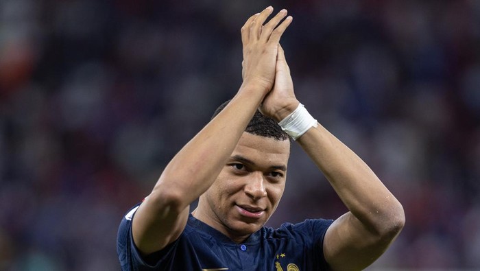 DOHA, QATAR - DECEMBER 04: Kylian Mbappe of France thanks the fans at full-time during the FIFA World Cup Qatar 2022 Round of 16 match between France (3) and Poland (1) at Al Thumama Stadium on December 04, 2022 in Doha, Qatar. (Photo by Simon Bruty/Anychance/Getty Images)