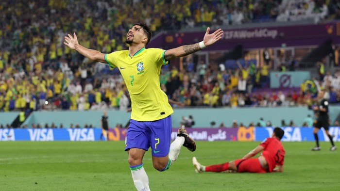 DOHA, QATAR - DECEMBER 05: Lucas Paqueta of Brazil celebrates after scoring the teams fourth goal during the FIFA World Cup Qatar 2022 Round of 16 match between Brazil and South Korea at Stadium 974 on December 05, 2022 in Doha, Qatar. (Photo by Francois Nel/Getty Images)