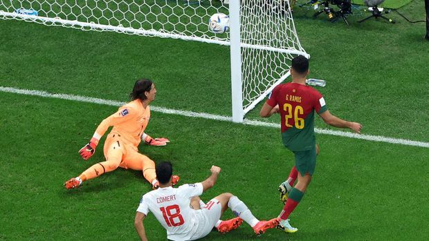 TOPSHOT - Portugal's forward #26 Goncalo Ramos scores his team's third goal during the Qatar 2022 World Cup round of 16 football match between Portugal and Switzerland at Lusail Stadium in Lusail, north of Doha on December 6, 2022. (Photo by Giuseppe CACACE / AFP) (Photo by GIUSEPPE CACACE/AFP via Getty Images)