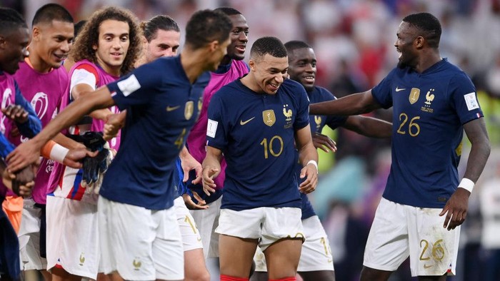 DOHA, QATAR - DECEMBER 04: Kylian Mbappe of France celebrates after the teams victory during the FIFA World Cup Qatar 2022 Round of 16 match between France and Poland at Al Thumama Stadium on December 04, 2022 in Doha, Qatar. (Photo by Laurence Griffiths/Getty Images)