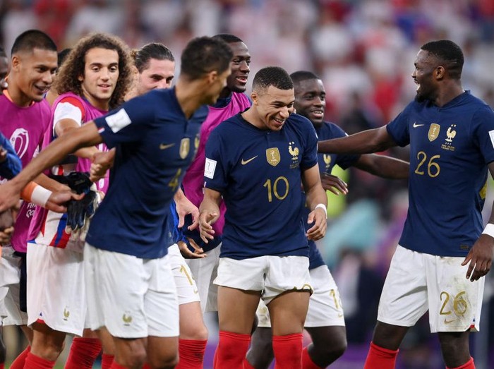 DOHA, QATAR - DECEMBER 04: Kylian Mbappe of France celebrates after the team's victory during the FIFA World Cup Qatar 2022 Round of 16 match between France and Poland at Al Thumama Stadium on December 04, 2022 in Doha, Qatar. (Photo by Laurence Griffiths/Getty Images)