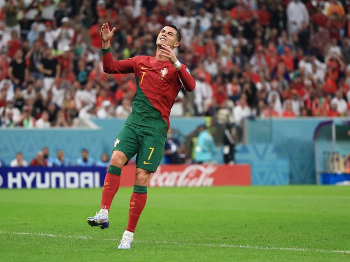 LUSAIL CITY, QATAR - DECEMBER 06: Cristiano Ronaldo of Portugal reacts during the FIFA World Cup Qatar 2022 Round of 16 match between Portugal and Switzerland at Lusail Stadium on December 06, 2022 in Lusail City, Qatar. (Photo by Buda Mendes/Getty Images)