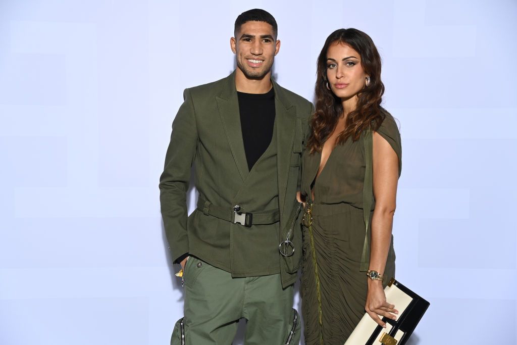 BOULOGNE-BILLANCOURT, FRANCE - SEPTEMBER 29: Achraf Hakimi and Hiba Abouk attend the Balmain Festival as part of Paris Fashion Week Womenswear Spring/Summer 2022 at La Seine Musicale on September 29, 2021 in Boulogne-Billancourt, France. (Photo by Pascal Le Segretain/Getty Images For Balmain)