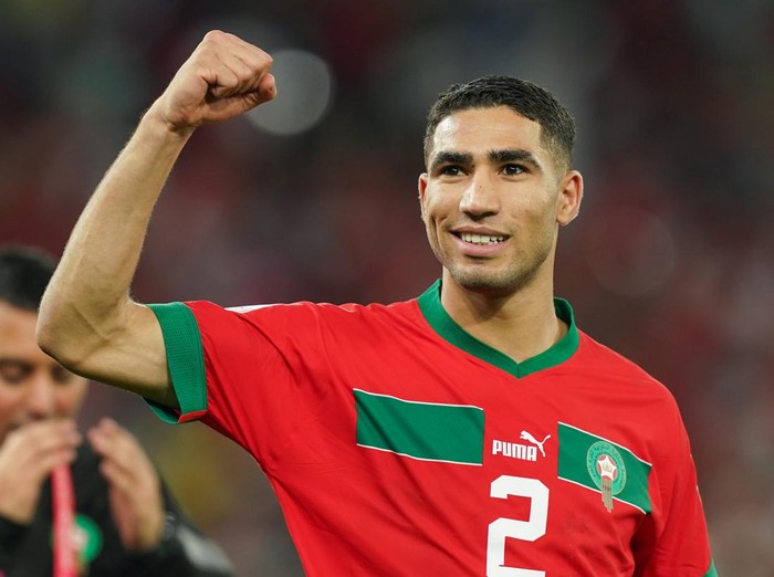 AL RAYYAN, QATAR - DECEMBER 06: Achraf Hakimi of Morocco celebrates after winning the FIFA World Cup Qatar 2022 Round of 16 match between Morocco and Spain at Education City Stadium on December 6, 2022 in Al Rayyan, Qatar. (Photo by Khalil Bashar/Jam Media/Getty Images)