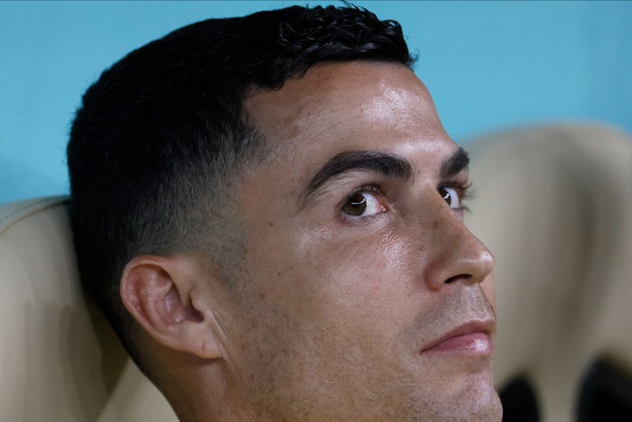 Cristiano Ronaldo LUSAIL CITY, QATAR - DECEMBER 06: Cristiano Ronaldo of Portugal looks on before the FIFA World Cup Qatar 2022 Round of 16 match between Portugal and Switzerland at Lusail Stadium on December 6, 2022 in Lusail City, Qatar. (Photo by Richard Sellers/Getty Images)