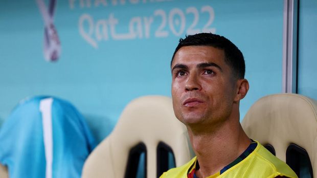 Soccer Football - FIFA World Cup Qatar 2022 - Round of 16 - Portugal v Switzerland - Lusail Stadium, Lusail, Qatar - December 6, 2022 Portugal's Cristiano Ronaldo on the substitutes bench before the match REUTERS/Kai Pfaffenbach