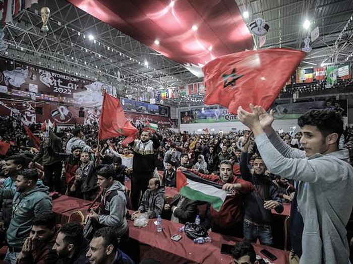 Palestinians fans watch the match between Morocco and Spain during the Qatar 2022 World Cup football in Gaza City, on December 6,2022. (Photo by Sameh Rahmi/NurPhoto via Getty Images)