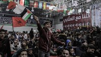 Warga Palestina berkumpul di Gaza untuk menyaksikan laga antara Maroko lawan Spanyol.  