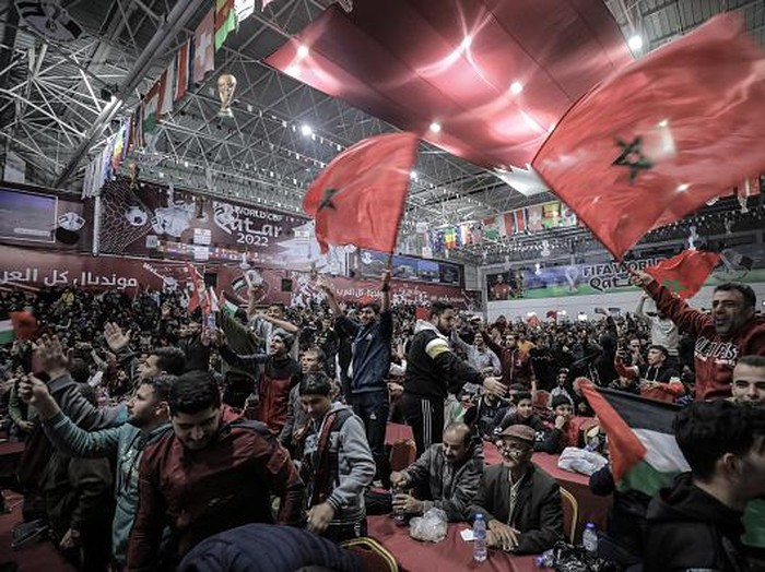 Palestinians fans watch the match between Morocco and Spain during the Qatar 2022 World Cup football in Gaza City, on December 6,2022. (Photo by Sameh Rahmi/NurPhoto via Getty Images)